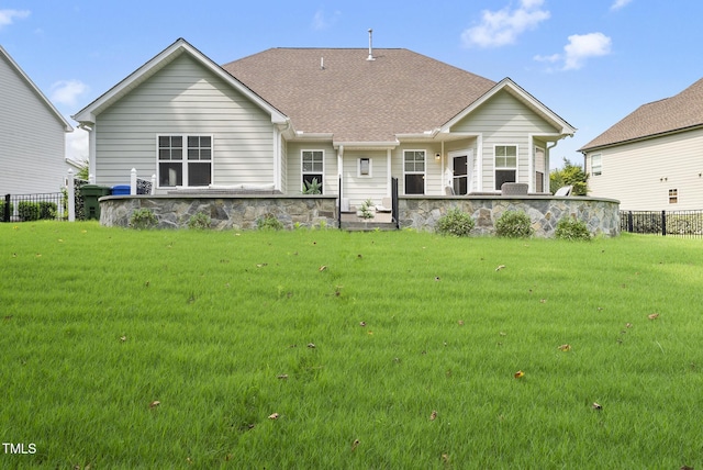 347 Country Mill Way, Fuquay Varina, NC 27526 - back of house with stone siding and a shingled roof