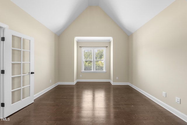 347 Country Mill Way, Fuquay Varina, NC 27526 - spare room featuring dark wood-type flooring and vaulted ceiling