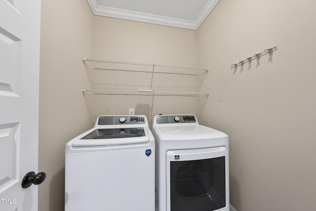 347 Country Mill Way, Fuquay Varina, NC 27526 - washroom featuring washing machine and clothes dryer and crown molding
