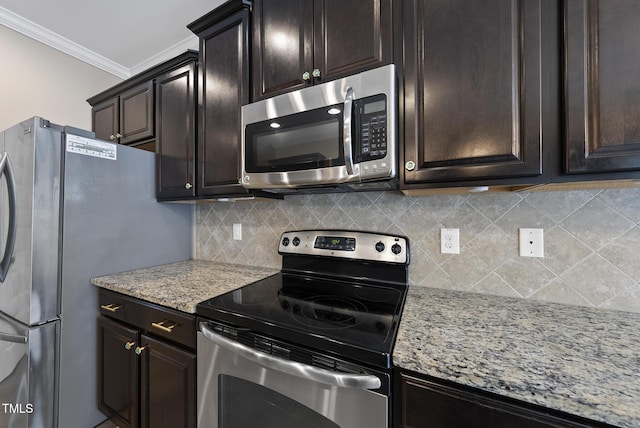 347 Country Mill Way, Fuquay Varina, NC 27526 - kitchen with appliances with stainless steel finishes, crown molding, backsplash, and light stone counters