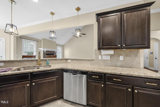 347 Country Mill Way, Fuquay Varina, NC 27526 - kitchen featuring stainless steel dishwasher, decorative backsplash, light stone countertops, dark brown cabinetry, and crown molding
