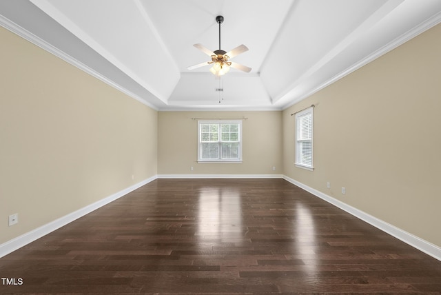 347 Country Mill Way, Fuquay Varina, NC 27526 - empty room featuring dark wood-type flooring, a ceiling fan, a raised ceiling, and vaulted ceiling