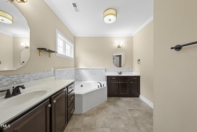 347 Country Mill Way, Fuquay Varina, NC 27526 - bathroom with crown molding, two vanities, a garden tub, and stone finish flooring