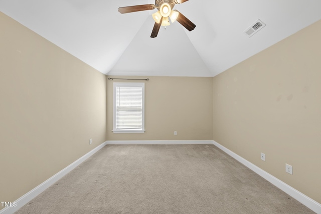 347 Country Mill Way, Fuquay Varina, NC 27526 - spare room with a ceiling fan, light colored carpet, and lofted ceiling