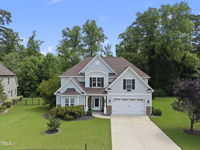 347 Country Mill Way, Fuquay Varina, NC 27526 - craftsman-style house with concrete driveway, a garage, stone siding, and a shingled roof