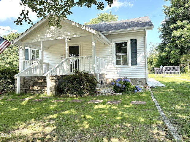 6 First St, Franklinton, NC 27525 - bungalow featuring a shingled roof and a porch