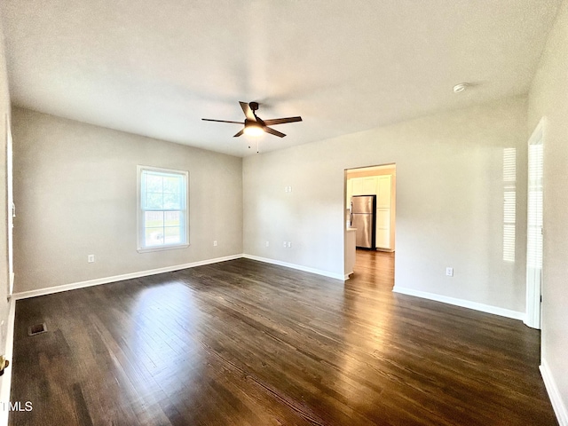 6 First St, Franklinton, NC 27525 - unfurnished room featuring ceiling fan, dark wood-style floors, and a smoke detector