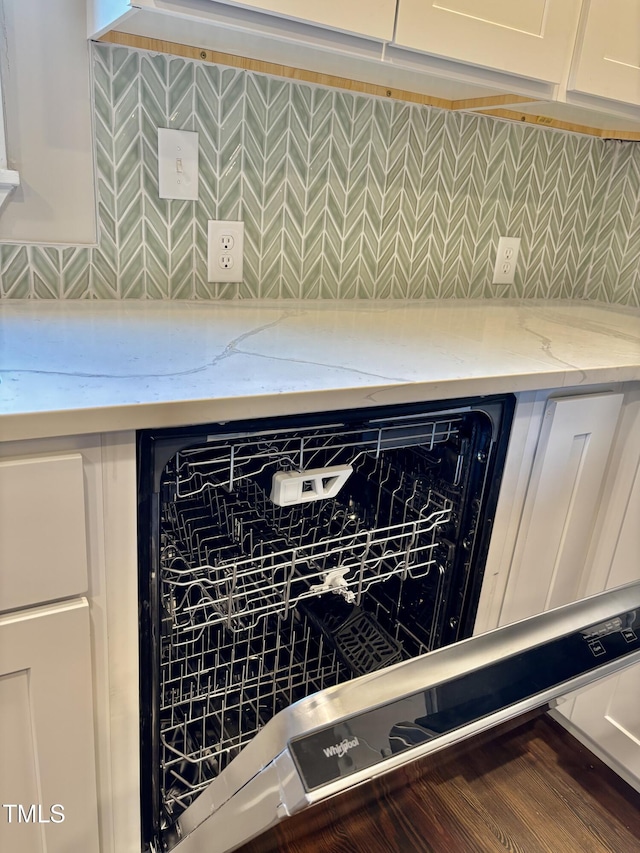 6 First St, Franklinton, NC 27525 - kitchen view of tasteful backsplash, white cabinets, and light stone countertops