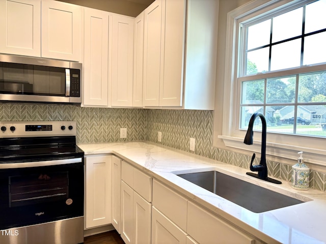 6 First St, Franklinton, NC 27525 - kitchen with stainless steel appliances and white cabinetry