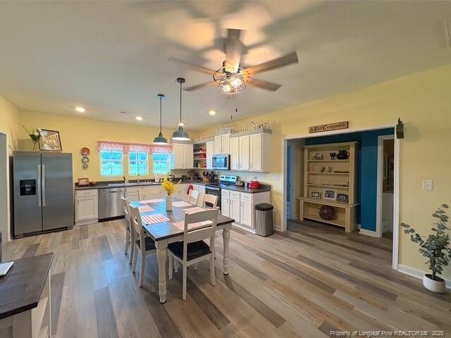893 Blanchard Rd, Saint Pauls, NC 28384 - dining area with a ceiling fan, light wood finished floors, and recessed lighting