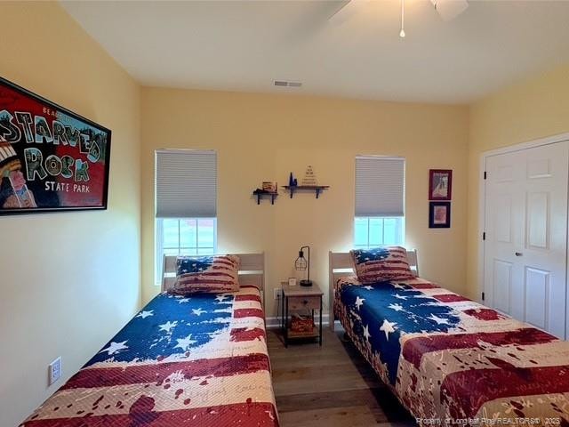 893 Blanchard Rd, Saint Pauls, NC 28384 - bedroom featuring wood finished floors and ceiling fan