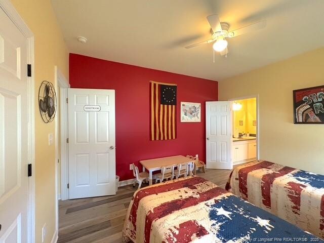 893 Blanchard Rd, Saint Pauls, NC 28384 - bedroom featuring wood finished floors and a ceiling fan