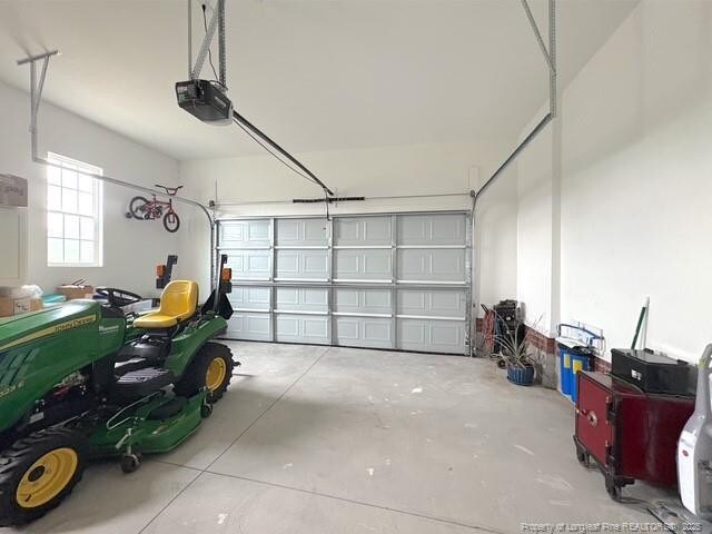 893 Blanchard Rd, Saint Pauls, NC 28384 - garage with a garage door opener