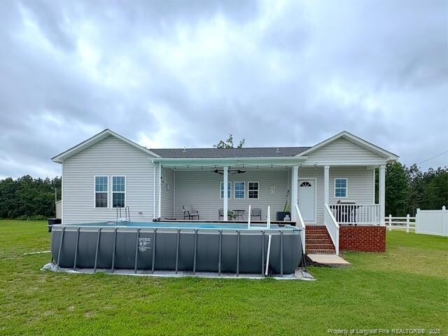 893 Blanchard Rd, Saint Pauls, NC 28384 - rear view of property featuring an outdoor pool