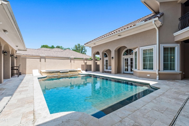 19 San Rimini Way, Durham, NC 27707 - view of swimming pool with french doors, a patio area, and a pool with connected hot tub