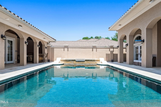 19 San Rimini Way, Durham, NC 27707 - view of pool featuring a patio, french doors, and a pool with connected hot tub