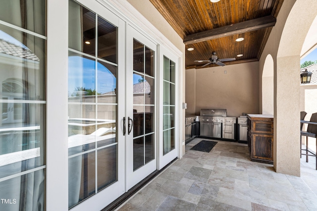 19 San Rimini Way, Durham, NC 27707 - balcony featuring an outdoor kitchen, a ceiling fan, and a bar