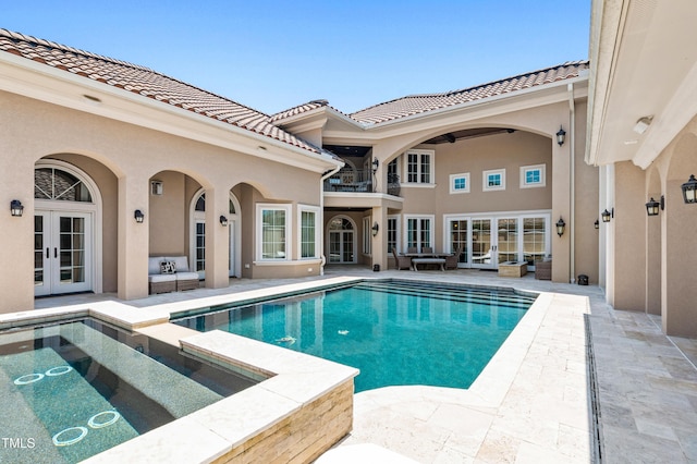 19 San Rimini Way, Durham, NC 27707 - view of pool featuring french doors, a pool with connected hot tub, a patio, and outdoor lounge area