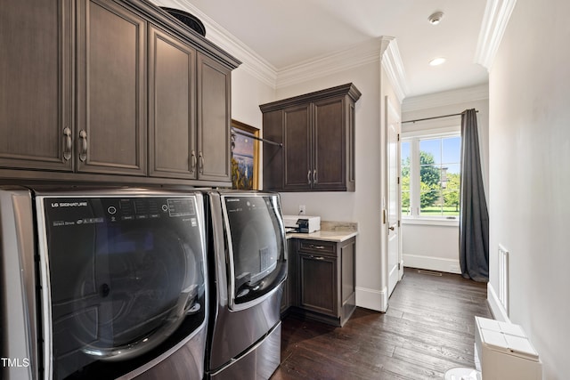 19 San Rimini Way, Durham, NC 27707 - laundry area featuring washing machine and dryer, cabinet space, dark wood finished floors, crown molding, and recessed lighting