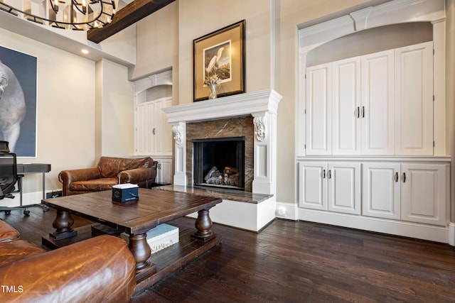 19 San Rimini Way, Durham, NC 27707 - living room with dark wood finished floors, a premium fireplace, and a chandelier