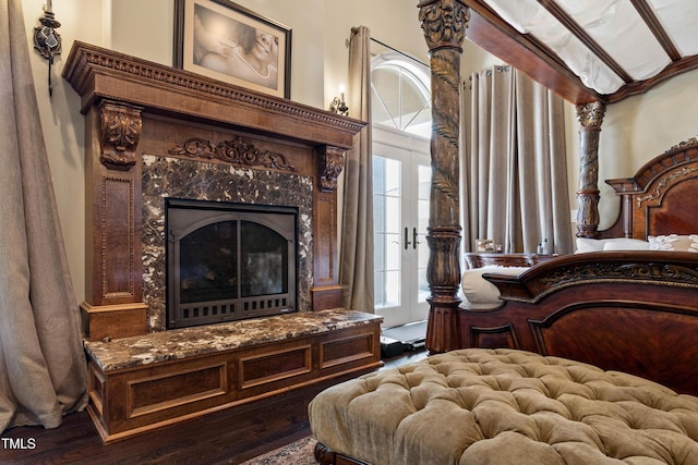 19 San Rimini Way, Durham, NC 27707 - bedroom featuring wood finished floors, access to outside, a high end fireplace, and french doors