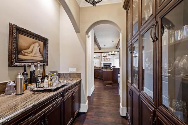 19 San Rimini Way, Durham, NC 27707 - bar with arched walkways, a chandelier, dark wood-style floors, and crown molding
