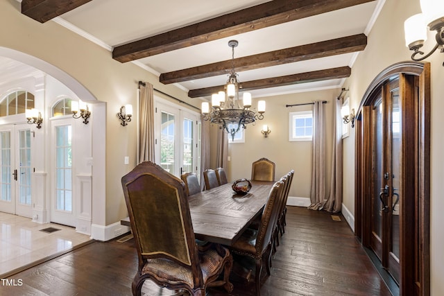 19 San Rimini Way, Durham, NC 27707 - dining space with french doors, a chandelier, beamed ceiling, plenty of natural light, and dark wood finished floors
