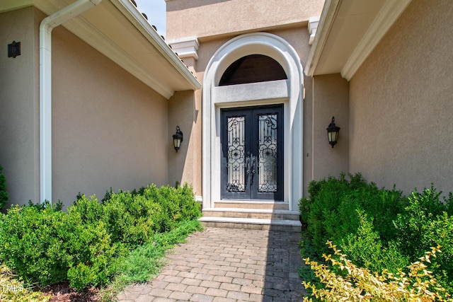 19 San Rimini Way, Durham, NC 27707 - view of exterior entry featuring stucco siding