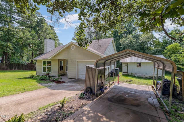 5700 Eagle Pass Cir, Fayetteville, NC 28304 - view of front of house with concrete driveway, a chimney, a garage, and a carport