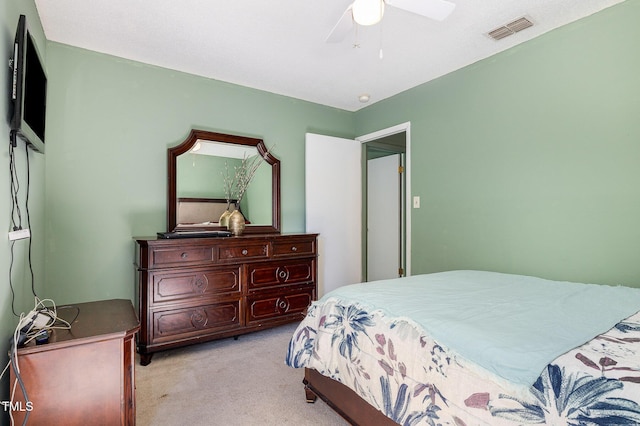 5700 Eagle Pass Cir, Fayetteville, NC 28304 - bedroom featuring light colored carpet and a ceiling fan