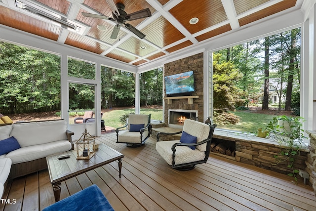 107 Ackworth Ct, Cary, NC 27519 - sunroom with an outdoor living space with a fireplace, a ceiling fan, plenty of natural light, and coffered ceiling