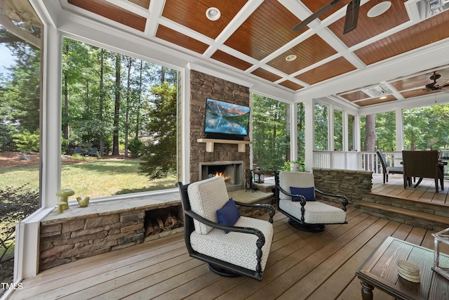 107 Ackworth Ct, Cary, NC 27519 - sunroom / solarium featuring a fireplace, coffered ceiling, ceiling fan, healthy amount of natural light, and beamed ceiling