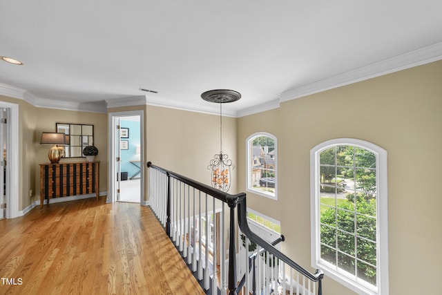 107 Ackworth Ct, Cary, NC 27519 - hallway with an upstairs landing, crown molding, and wood finished floors