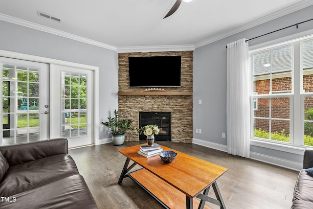 124 Moss Creek Pl, Fuquay Varina, NC 27526 - living room with ceiling fan, ornamental molding, wood finished floors, and a fireplace