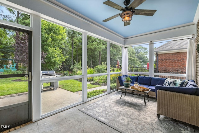 124 Moss Creek Pl, Fuquay Varina, NC 27526 - sunroom featuring a ceiling fan and an outdoor hangout area