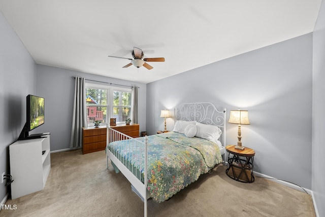 8613 Lobelia St, Raleigh, NC 27603 - bedroom featuring light colored carpet and a ceiling fan