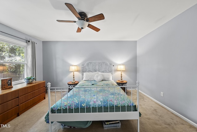 8613 Lobelia St, Raleigh, NC 27603 - bedroom with carpet and a ceiling fan