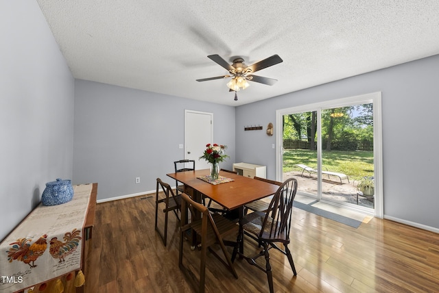 8613 Lobelia St, Raleigh, NC 27603 - dining room with wood finished floors, ceiling fan, and a textured ceiling