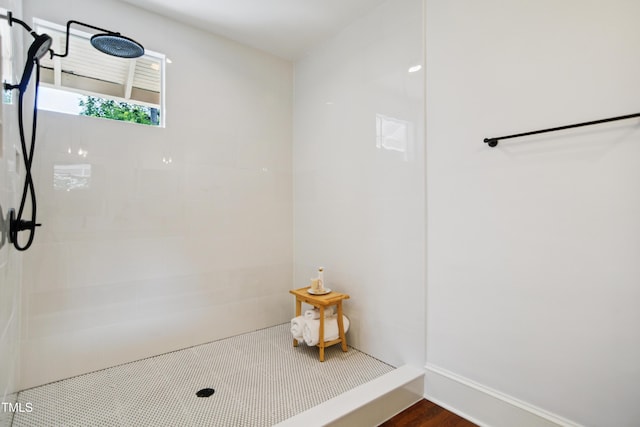 2005 Glenwood Ave, Raleigh, NC 27608 - full bathroom featuring tiled shower and wood finished floors