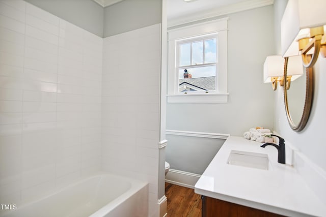 2005 Glenwood Ave, Raleigh, NC 27608 - bathroom with vanity, wood finished floors, bathtub / shower combination, and ornamental molding