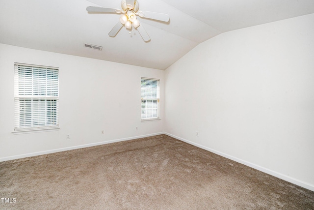 524 Summer Breeze Dr, Durham, NC 27704 - empty room with vaulted ceiling, carpet, and ceiling fan