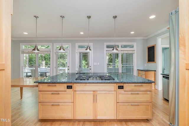 11 Kingswood Ln, Chapel Hill, NC 27517 - kitchen with stainless steel gas stovetop, light brown cabinetry, light wood-style flooring, dark stone counters, and crown molding