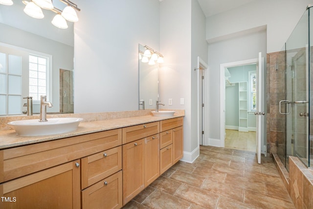 11 Kingswood Ln, Chapel Hill, NC 27517 - full bathroom with double vanity, a stall shower, and a spacious closet
