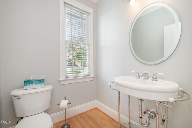 11 Kingswood Ln, Chapel Hill, NC 27517 - half bathroom with baseboards and wood finished floors