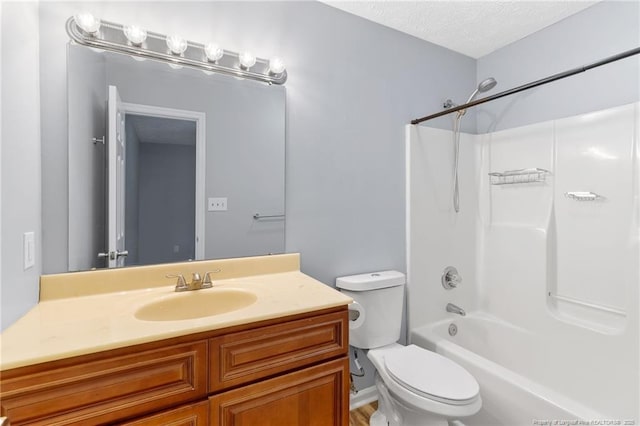 1591 Hazelcrest Dr, Fayetteville, NC 28304 - full bath featuring vanity, washtub / shower combination, and a textured ceiling