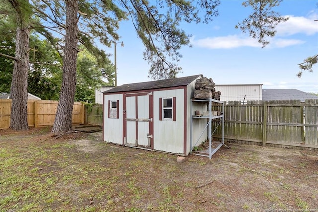 1591 Hazelcrest Dr, Fayetteville, NC 28304 - view of shed with a fenced backyard