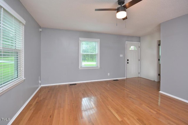 3300 Shaftsbury Drive St, Durham, NC 27704 - spare room featuring light wood-style floors and ceiling fan