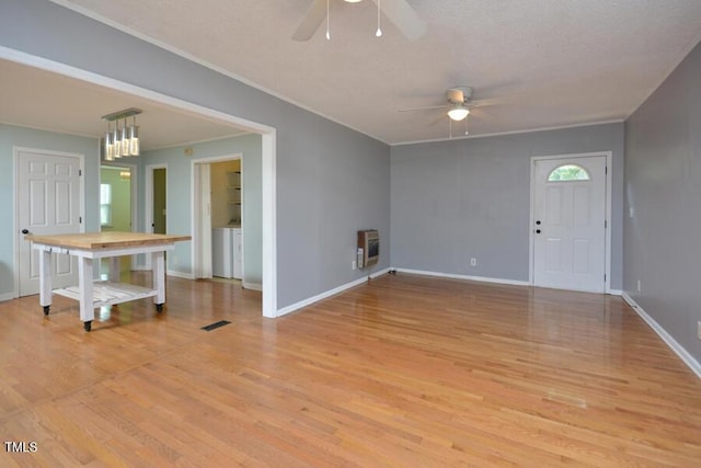 3300 Shaftsbury Drive St, Durham, NC 27704 - foyer featuring ceiling fan, light wood-style floors, and heating unit
