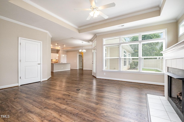 1164 Hudson Dr, Mebane, NC 27302 - unfurnished living room with a fireplace, ornamental molding, dark wood-type flooring, and healthy amount of natural light