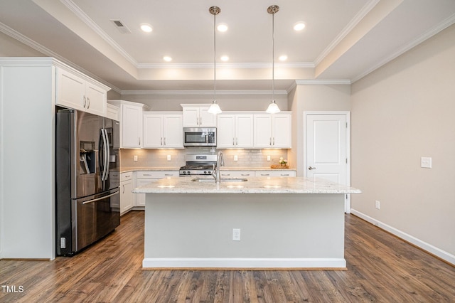 1164 Hudson Dr, Mebane, NC 27302 - kitchen with stainless steel appliances, dark wood-type flooring, white cabinets, decorative backsplash, and crown molding